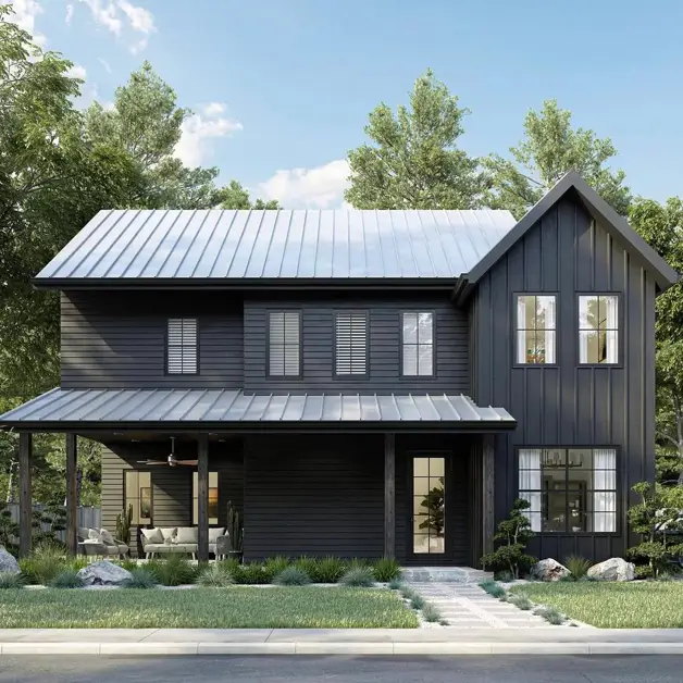 A modern black house with a bright, light-colored standing-seam metal roof providing a clean contrast.