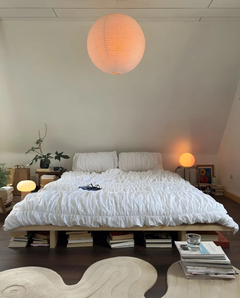 Bedroom with under-bed book storage.