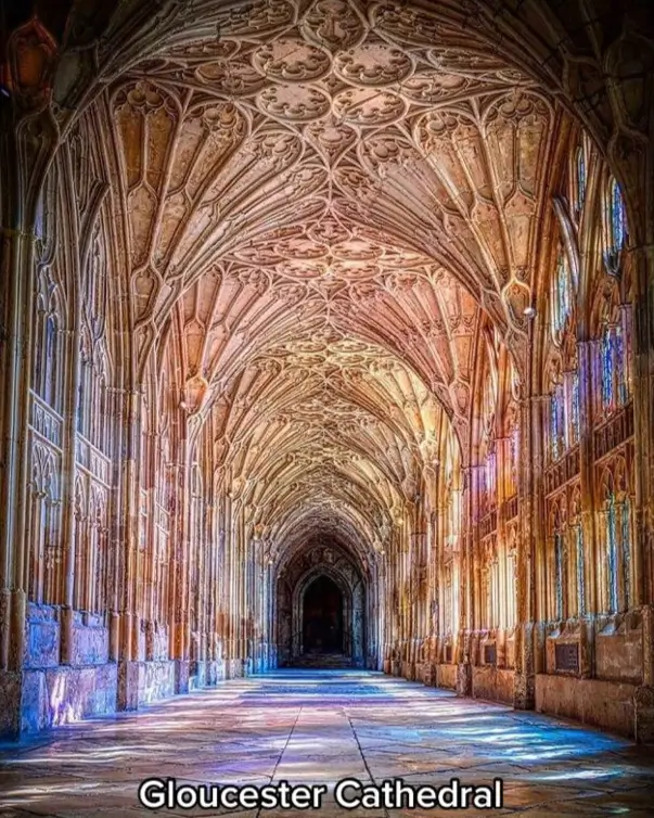 The interior of a grand hallway with a dramatic fan-vaulted ceiling, a timeless architectural idea.