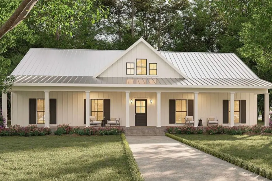 A modern country house design featuring a single-story white farmhouse with a long porch and a metal roof.