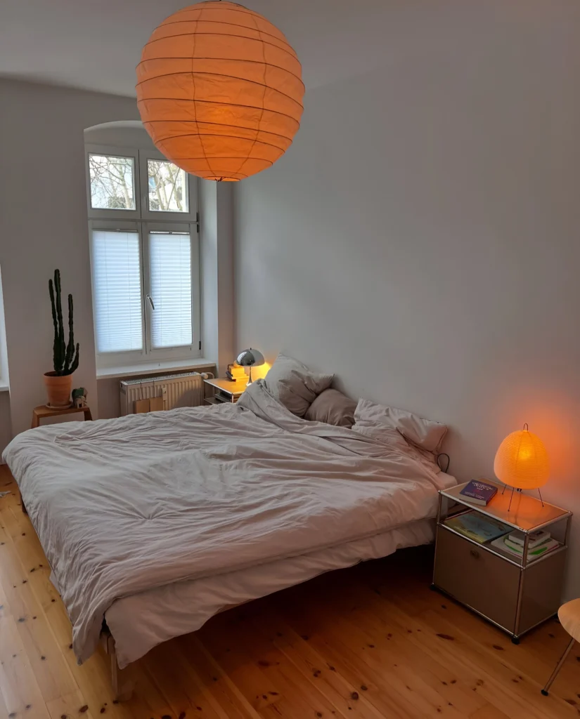 Bedroom with warm lighting.