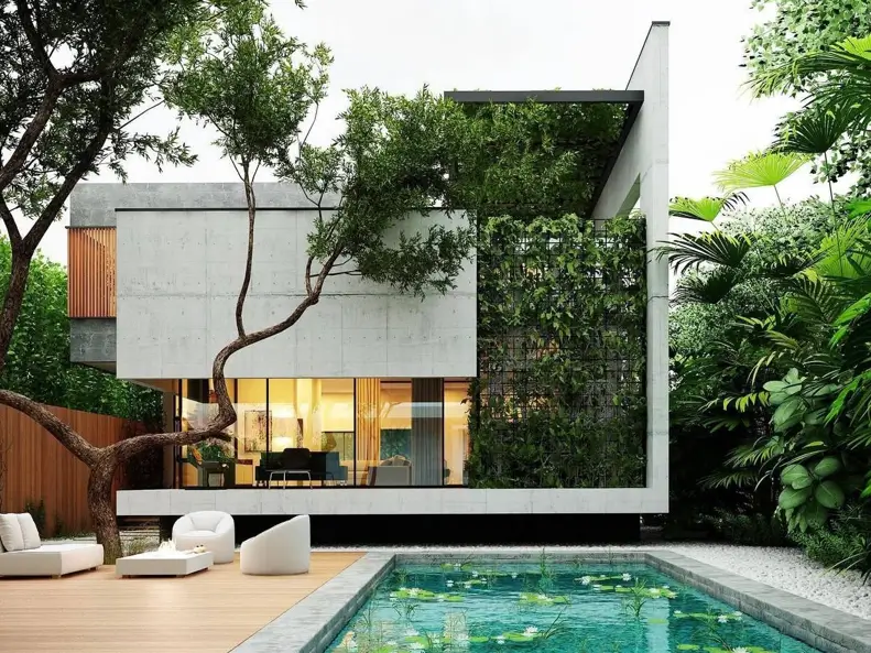 A modern concrete house design featuring a lush vertical garden that softens the exterior, overlooking a tranquil poolside patio.