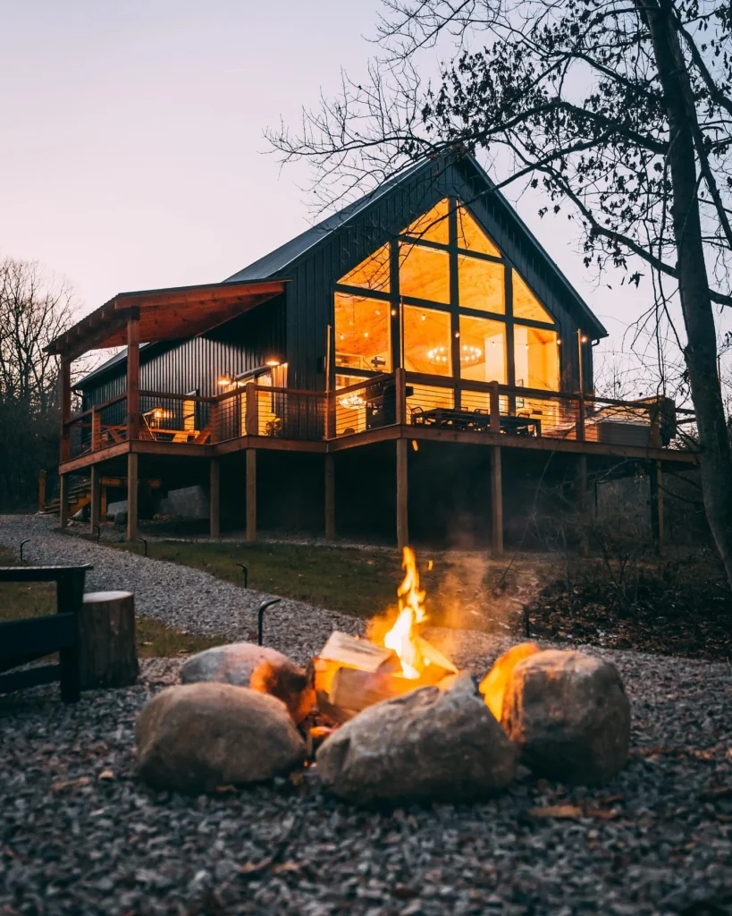 A-frame stunning house design with large glass windows.