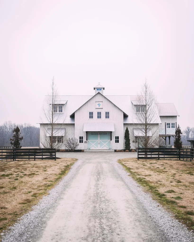 Stunning Barndominium house design with grand entrance.