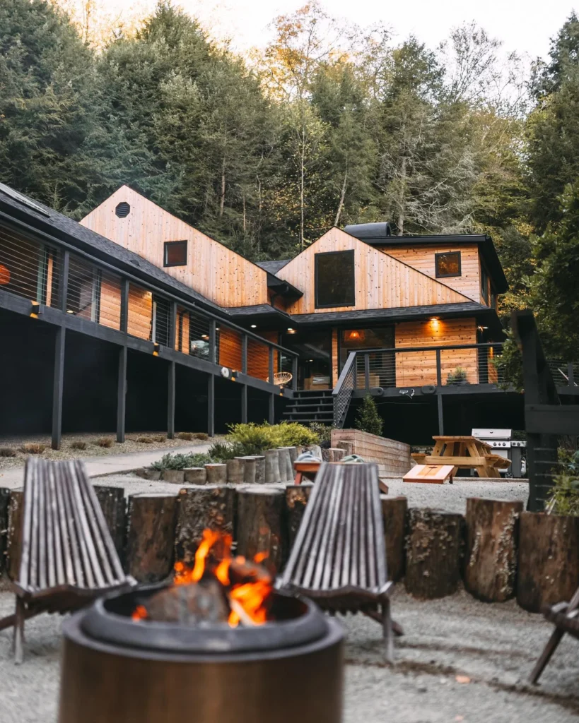 Stunning house design with wood siding and fire pit, Hocking Hills.