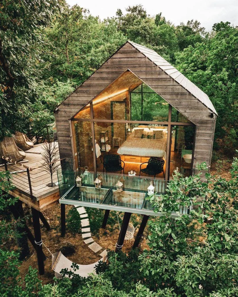 Luxurious treehouse stunning house design with glass floor.