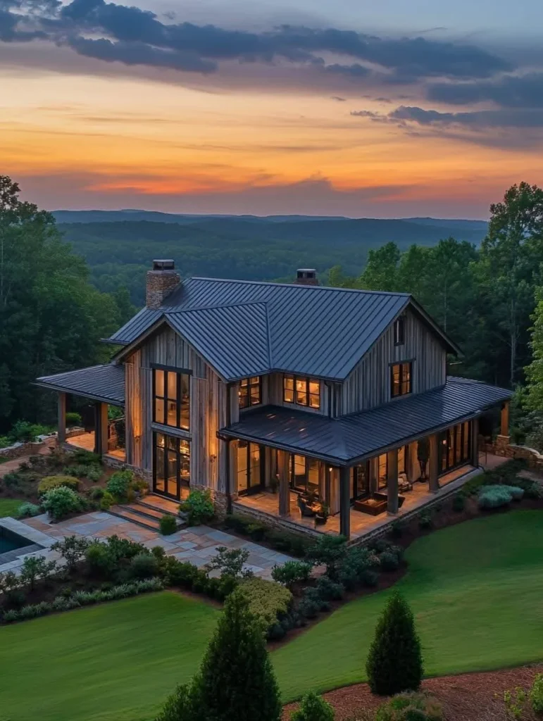 Rustic modern farmhouse with wood siding, wrap-around porch, large windows, sunset views.