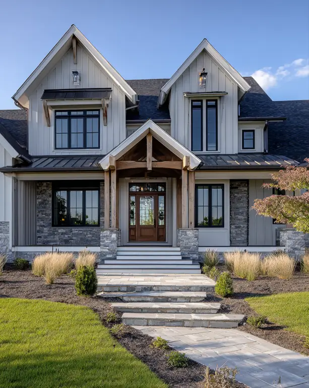 A modern rustic suburban house exterior that blends a rugged timber-framed entrance with a contemporary gray stone veneer base and light vertical siding.