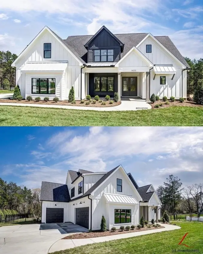 A large white and black modern farmhouse featuring a striking black center gable and black double front doors.