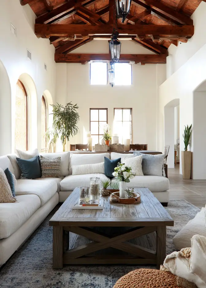 46 Modern Mediterranean Living Room Design Ideas 15 Airy Mediterranean living room design with soaring cathedral ceilings and dark exposed trusses.