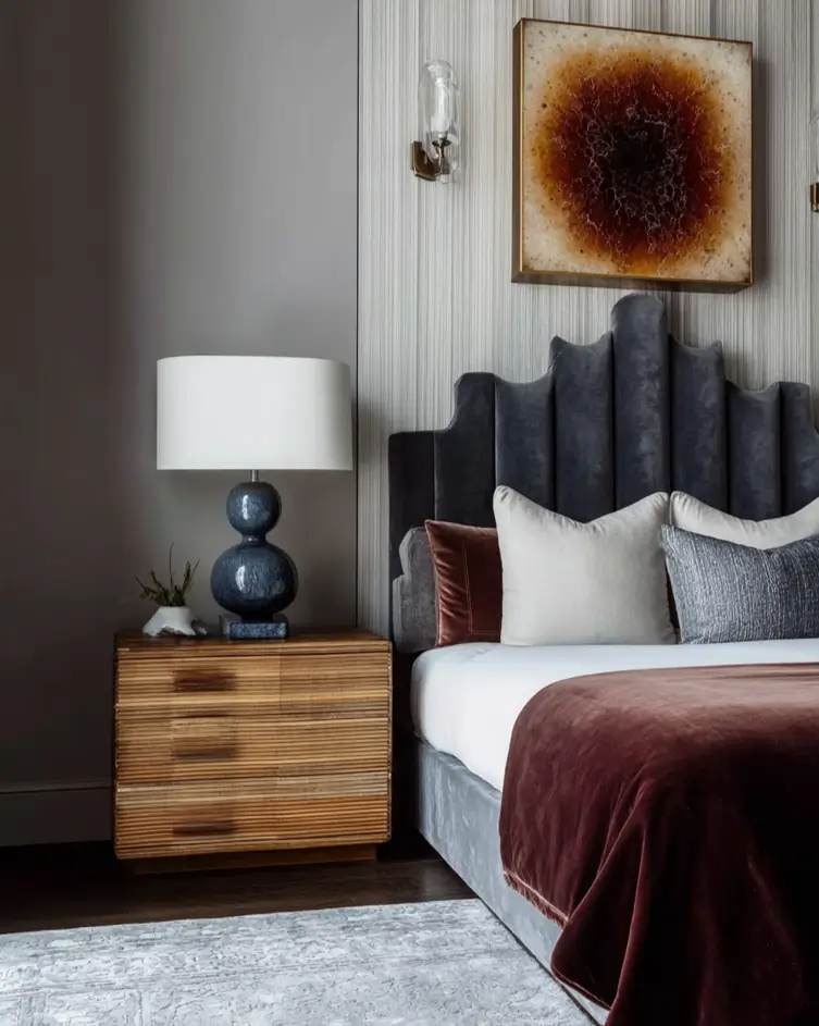 49 Headboard Design Ideas That Instantly Elevate Your Bedroom 19 Charcoal grey velvet stepped headboard with channel tufting and rust velvet accents.
