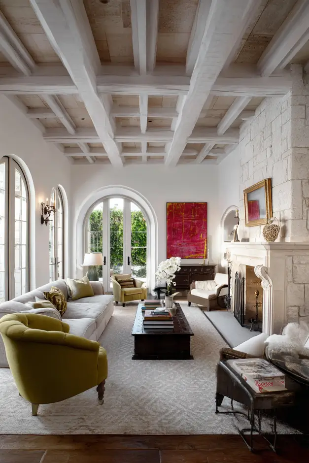 46 Modern Mediterranean Living Room Design Ideas 28 Mediterranean living room design with olive green velvet armchairs and exposed beams.