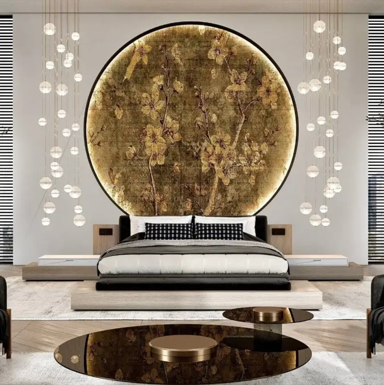 A luxury Japanese-style bedroom with a large gold circular art piece behind a platform bed and cascading bubble lights.