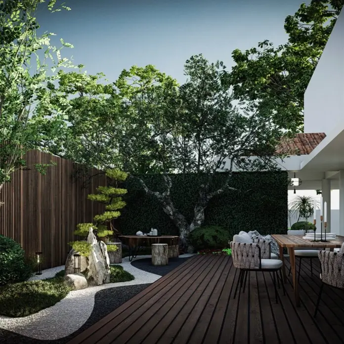 Modern backyard zen garden design integrated with a wooden deck and seating area.