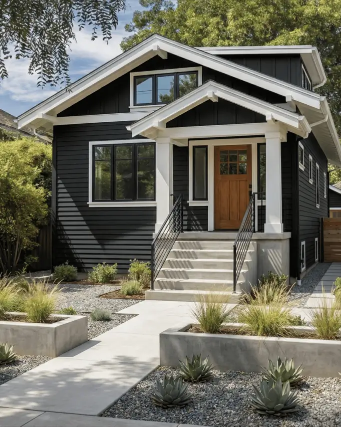 35 Small Craftsman House Ideas for Timeless Charm & Modern Living 12 Small Craftsman house featuring modern black siding and white trim.