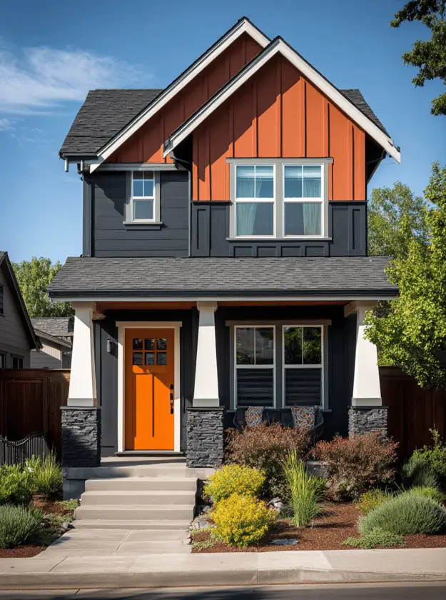 35 Small Craftsman House Ideas for Timeless Charm & Modern Living 29 Small Craftsman house featuring charcoal and rust-orange two-tone siding.