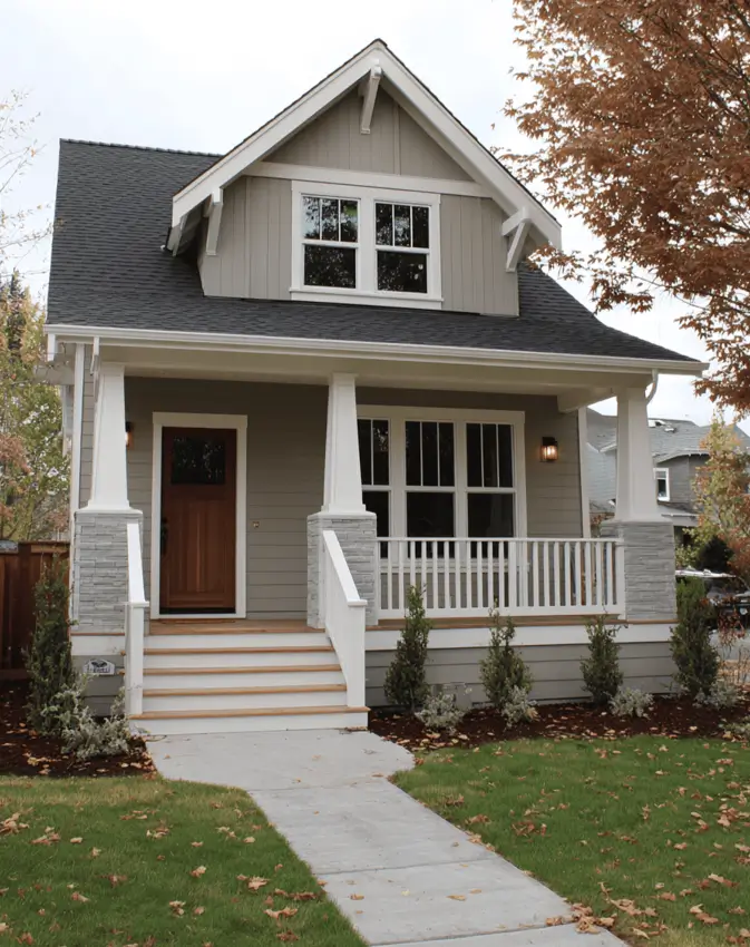 35 Small Craftsman House Ideas for Timeless Charm & Modern Living 37 Small Craftsman house featuring greige exterior and textured gables.