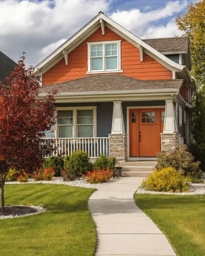 35 Small Craftsman House Ideas for Timeless Charm & Modern Living 8 Small Craftsman house featuring terracotta and blue split-tone siding.