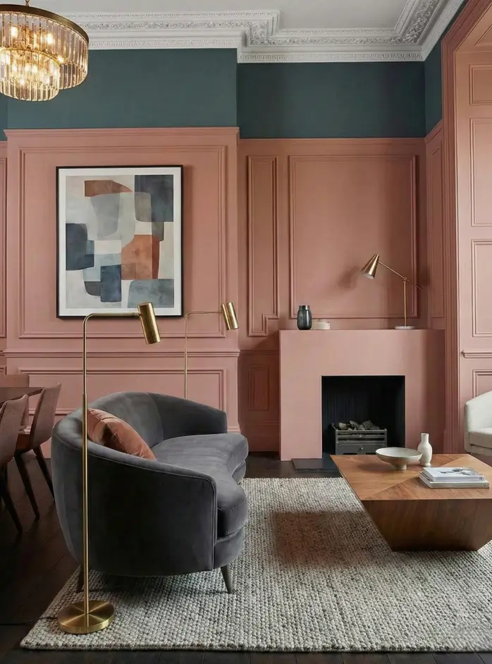 30 Modern Victorian Home Interior Ideas That Feel Timeless 12 Salmon pink paneling contrasts with deep teal upper walls in this color-blocked living room with a modern grey sofa.
