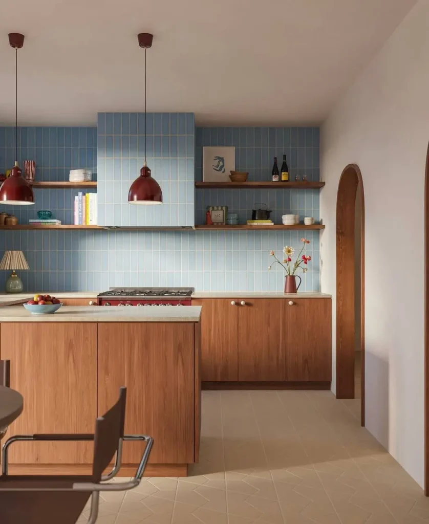 16 Kitchen Color Combination Ideas That Feel Right at Home 13 Warm teak wood kitchen cabinets against pale blue tiled walls