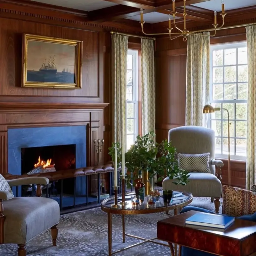 Colonial Interior Design Style: American vs. British (33 Real-Home Ideas) 18 American Colonial study with wood paneling, coffered ceiling, slate fireplace, and maritime oil painting