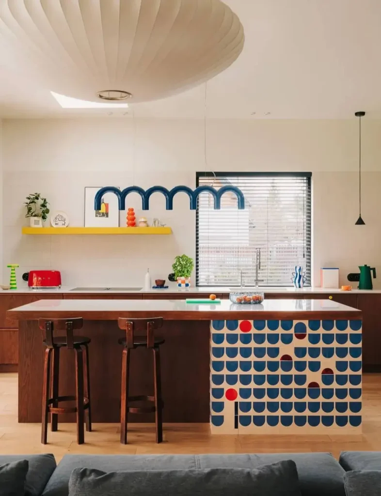 16 Kitchen Color Combination Ideas That Feel Right at Home 4 Cream kitchen with warm walnut wood cabinets and a patterned tile island