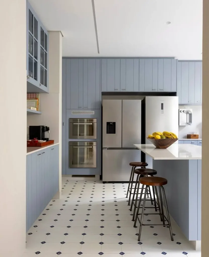 16 Kitchen Color Combination Ideas That Feel Right at Home 6 Kitchen with powder blue shaker cabinets and cream walls