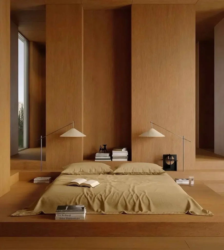 Japandi Style Bedroom: 33 Calm, Warm Ideas a Designer Loves 10 Japandi bedroom with floor-level platform bed, oak-paneled walls, mustard linen bedding, and paired cone lamps
