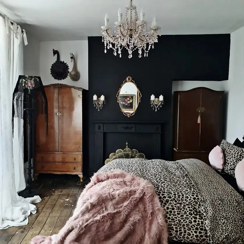 Victorian Style Bedroom: 30 Ideas for Romance Without the Heaviness 10 Victorian style bedroom with black chimney breast, crystal chandelier, gilt mirror, and antique wood wardrobes