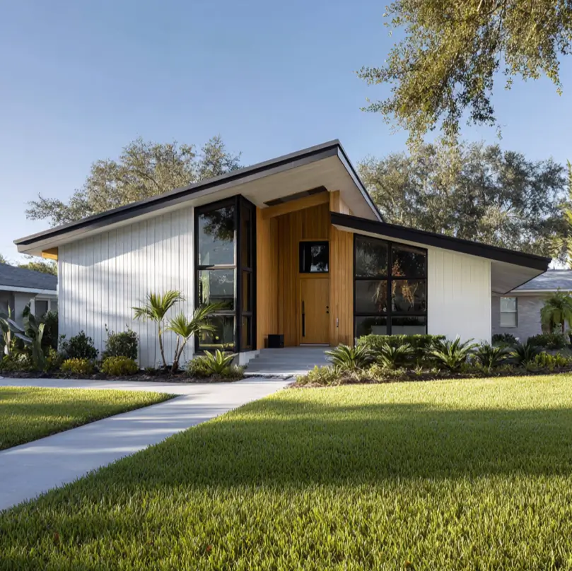 47 White Houses With Black Trim and Wood Accents We Love 3 Midcentury modern white house with black trim and wood accents at the recessed entry
