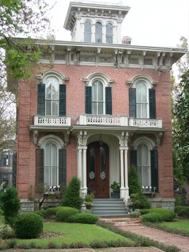 Italianate Style House: 33 Ideas and the Details That Give One Away 13 Bracketed entry porch on a red brick Italianate style house below a glazed rooftop belvedere