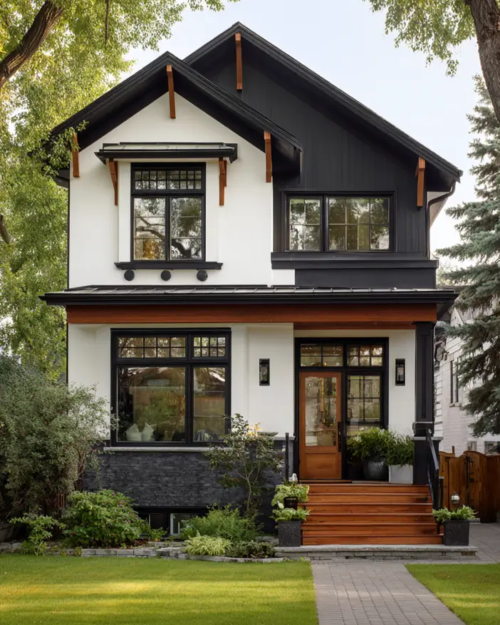 47 White Houses With Black Trim and Wood Accents We Love 15 Cedar knee brackets and a wood belt band on a white house with a black gable