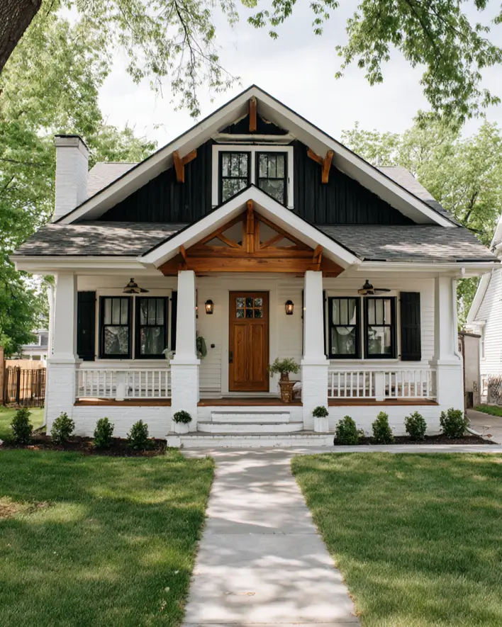 47 White Houses With Black Trim and Wood Accents We Love 23 Golden oak porch truss and knee braces on a white Craftsman bungalow with black trim