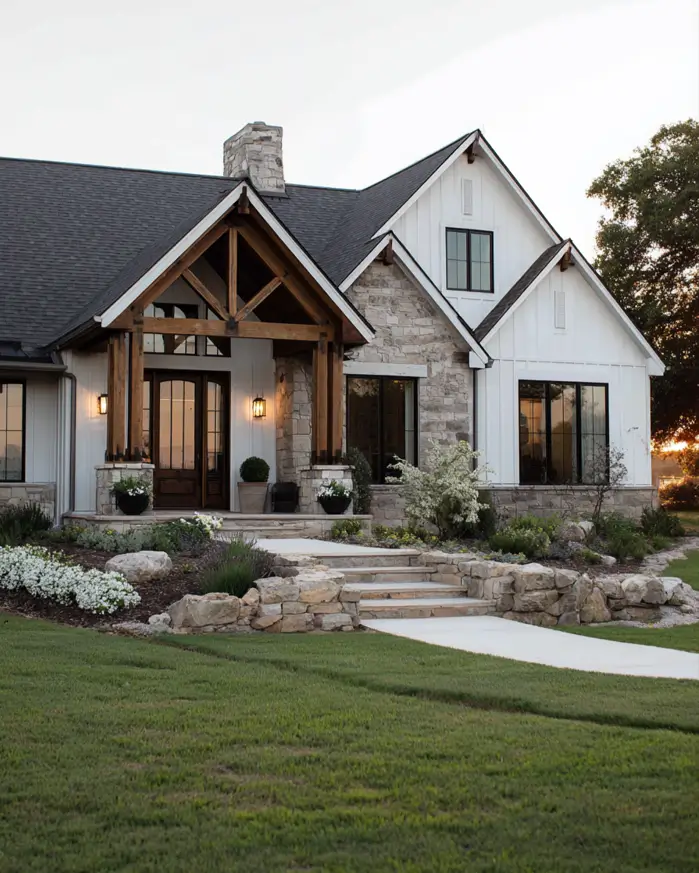 White Farmhouse with Stone Exterior: 29 Ideas That Feel Warm, Not Cold 29 Single-story white farmhouse with a cedar timber truss entry and sandy limestone accents