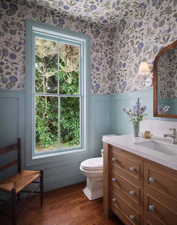 Italianate Style House: 33 Ideas and the Details That Give One Away 35 Bathroom added to an Italianate style house with paneled wainscot, floral wallpaper and a deep window casing