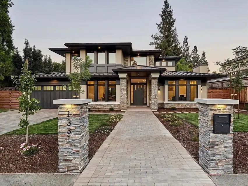 Prairie House Style: Key Features, History, and What Makes These Homes So Timeless 6 Contemporary Prairie style house exterior with stacked stone piers, stucco, and standing-seam hip roof