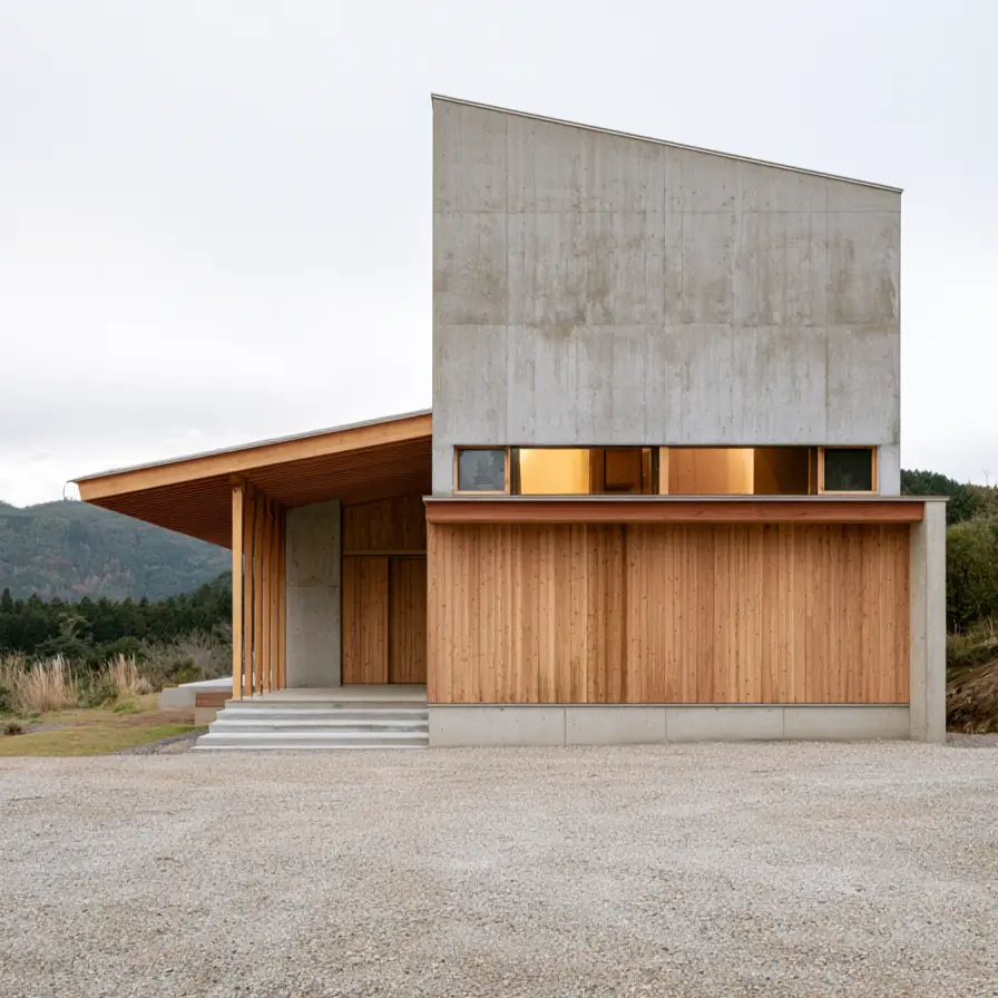 Modern Japanese House Design: 58 Ideas, Costs, and What Defines the Style 12 A tall board-formed concrete wall above cedar cladding, with a long timber eave on slim posts.