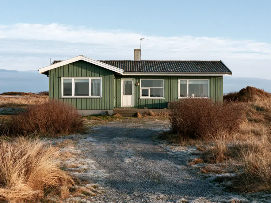 43 Green House With White Trim Ideas for Fresh Curb Appeal 16 olive green house with white trim, white door, and vertical board siding on a midcentury coastal summerhouse