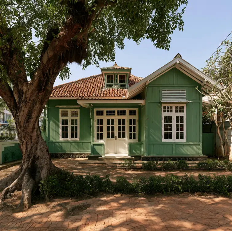 43 Green House With White Trim Ideas for Fresh Curb Appeal 21 jade green house with white trim, transom windows, and white French doors on a colonial-tropical bungalow
