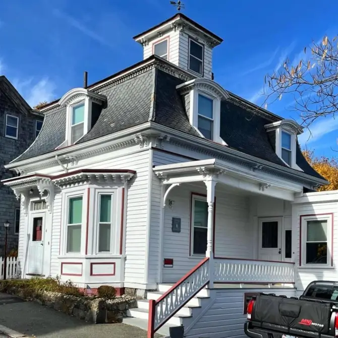White House with Red Trim: 27 Ideas and How to Pick Your Red 4 White Second Empire home with fine red pinstripe trim on the bay panels and porch frieze
