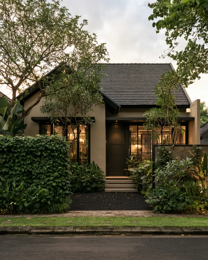 Taupe House With Black Trim: 28 Ideas + Best Paint Colors 26 Taupe house with black trim on a tropical taupe villa with black casement windows glowing at dusk