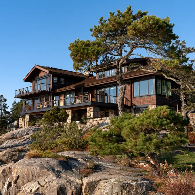 37 Brown House with Black Trim Ideas for a Warm, Modern Exterior 34 Dark brown house with black trim, a deep brown cedar-shingle clifftop home with black windows and charcoal deck railings