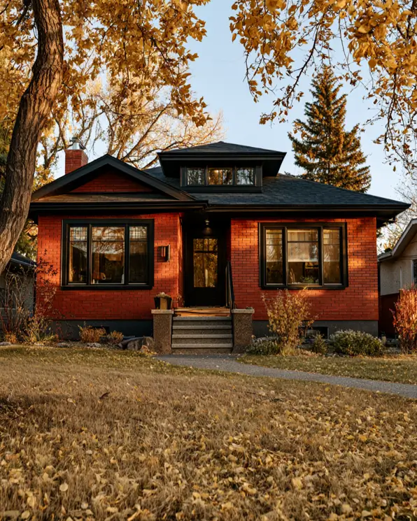 46 Red Brick House With Black Trim Ideas for Standout Curb Appeal 46 Red brick Craftsman bungalow with black trim windows, door, and roof