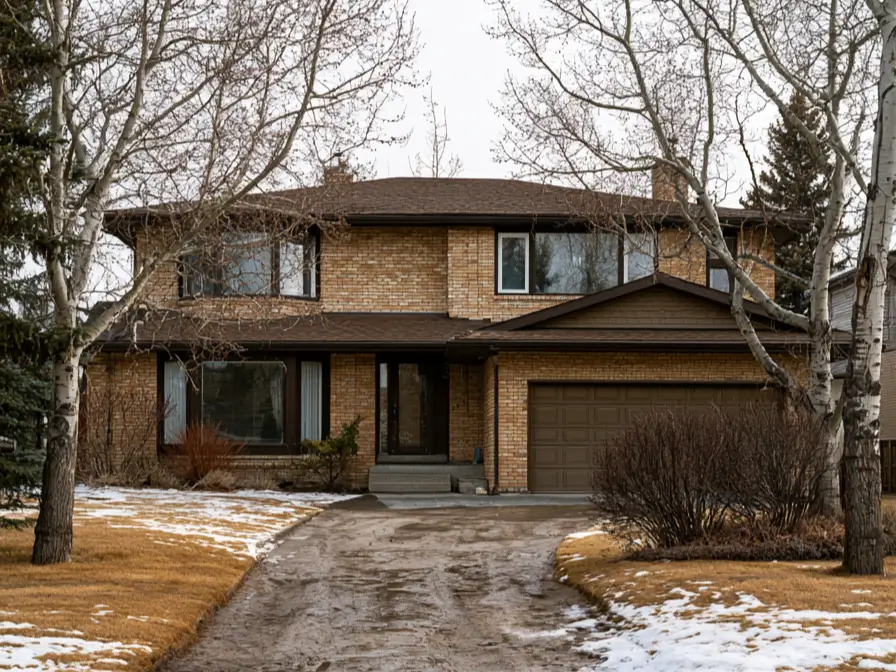 Blonde Brick House Ideas: 24 Warm Exteriors That Still Feel Fresh 26 Blonde brick split-level house with honeyed brick, deep brown trim and fascia, and a brown garage door